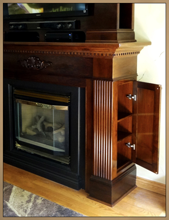 Fireplace Mantel Cabinet with side storage door open.